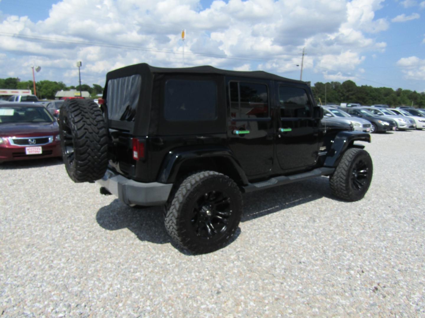 2015 Black /Tan Jeep Wrangler (1C4HJWEG4FL) with an V6 engine, Automatic transmission, located at 15016 S Hwy 231, Midland City, AL, 36350, (334) 983-3001, 31.306210, -85.495277 - Photo#7